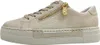 A side view of a single beige sneaker with a platform sole and a gold zipper. Náhled obrázku produktu