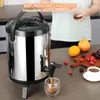 A person is pouring a beverage from a large insulated dispenser into a glass, with fruits and a cup of coffee on the counter. Produktbild-Vorschau