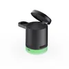 A product shot of a black and green wireless charging station with its lid open, set against a white background. Produktbild-Vorschau