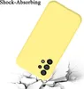 A yellow phone case is shown falling onto a cracked surface, illustrating its shock-absorbing feature. Náhľad obrázku produktu