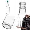 A collage of four images showing a clear glass bottle from different angles, including a close-up of the neck and base, and a person holding the bottle. Náhled obrázku produktu