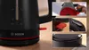 A collage of close-up shots of a black Bosch electric kettle with red accents, showing details like the water level indicator, lid, and handle. Podgląd zdjęcia produktu