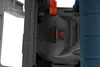 A close-up view of a power tool's internal mechanism, featuring a black dial and a red warning symbol. Náhľad obrázku produktu