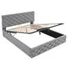 A grey upholstered bed frame with the mattress support mechanism lifted to reveal storage space underneath. Náhľad obrázku produktu