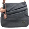 A close-up studio shot of a gray handbag with brown accents. Produktbild-Vorschau
