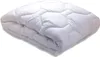 A white quilted comforter folded and lying on a white surface. Náhled obrázku produktu