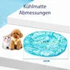 A small dog and cat are shown next to a blue, circular cooling mat with water ripple patterns. Dimensions are indicated on the mat. Produktbild-Vorschau