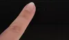 A finger is pressing a button on a black surface. Anteprima dell’immagine prodotto