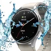 A smartwatch is shown with water splashing around it, highlighting its water-resistant feature. Produktbild-Vorschau