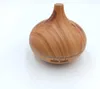 A wooden-patterned ultrasonic humidifier is shown against a white background. Podgląd zdjęcia produktu