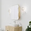 A bathroom vanity with a sink, faucet, and medicine cabinet. Podgląd zdjęcia produktu