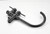A black freestanding bathtub faucet with a curved spout and two handles is shown against a white background. Produktbild-Vorschau