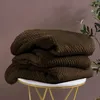 Koc MONTE 75x150 cm — gruby pled dekoracyjny, kolor brązowy Podgląd zdjęcia produktu 2
