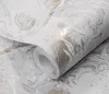 A roll of wallpaper with a marble-like pattern. Podgląd zdjęcia produktu