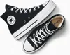 A pair of black Converse Chuck Taylor All Star high-top sneakers are shown from a top-down perspective against a white background. Voir les images du produit