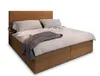 A bed with pillows and a blanket, shown from a diagonal angle against a white background. Produktbild-Vorschau