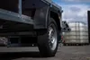 Close-up of a trailer wheel and fender. Produktbild-Vorschau