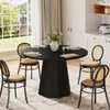 A dining room scene with a round black table and four chairs, set for a meal. Produktbild-Vorschau