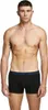 A man is shown from the chest down, wearing black boxer shorts with a blue waistband. Produktbild-Vorschau