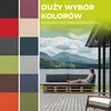 An outdoor living space with a sofa made of pallets and cushions, overlooking a lake and mountains. Podgląd zdjęcia produktu