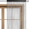 A string curtain hangs in front of a wooden window frame. Náhľad obrázku produktu