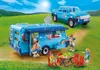 A family is camping with a pick-up truck and a camper van, enjoying a meal outdoors. Produktbild-Vorschau