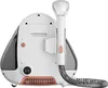 The back view of a white and copper fabric stain remover machine with a hose attached. Podgląd zdjęcia produktu