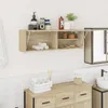 A bathroom scene with a wall-mounted cabinet and vanity. Anteprima dell’immagine prodotto