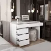 A white desk with an open laptop and a vase of flowers, set in a modern bedroom with mirrored closet doors. Produktbild-Vorschau