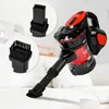 A cordless vacuum cleaner with attachments is shown on a white surface, likely a sofa or bed. Produktbild-Vorschau