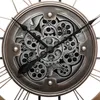 Close-up of a decorative clock mechanism with gears. Náhľad obrázku produktu
