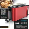 A red toaster with a bread roll attachment and a crumb tray, shown with some bread rolls in a wooden box in the background. Marketing text and safety certifications are overlaid. Produktbild-Vorschau