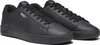 A pair of black Puma sneakers. Produktbild-Vorschau