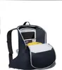 An open backpack with items inside. Produktbild-Vorschau