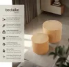 Two round wooden side tables are shown in a modern living room setting, with a text overlay describing their features. Produktbild-Vorschau