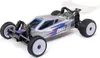 A silver remote-controlled buggy with blue and pink accents, shown from a three-quarter front angle on a white background. Anteprima dell’immagine prodotto
