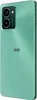 A close-up, angled view of the back of a green smartphone. Náhled obrázku produktu