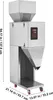 A stainless steel particle filling machine with a digital display and hopper, shown on a white background with dimensions indicated. Náhled obrázku produktu