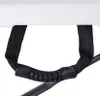 A close-up view of a black fabric handle with a black plastic grip attached to a white surface. Produktbild-Vorschau