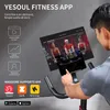 A person using a fitness bike with a screen displaying a fitness app. Anteprima dell’immagine prodotto