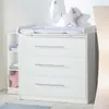 A white baby changing dresser with three drawers and an attached changing pad. Produktbild-Vorschau