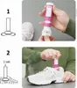 Two-panel image showing instructions for using a shoe deodorizer spray. The top panel shows a hand holding the spray can, and the bottom panel shows the spray being used inside a shoe. Produktbild-Vorschau