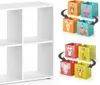 A white shelving unit with several fabric storage boxes featuring animal designs. Produktbild-Vorschau