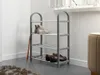 A shoe rack with shoes on it, placed in a room. Náhled obrázku produktu