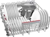 The image shows the interior of a dishwasher rack filled with clean dishes and a pot. Anteprima dell’immagine prodotto