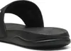 Close-up of the sole and strap of a black PUMA slide sandal. Anteprima dell’immagine prodotto