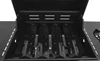 Close-up view of the interior of a black gas grill with the lid open, showing the burner covers. Podgląd zdjęcia produktu