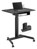 A black adjustable height standing desk with a laptop, a glass of water, and a book on it. Produktbild-Vorschau