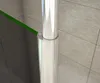 Close-up of a shower enclosure fitting, showing a silver pole and a green glass edge. Produktbild-Vorschau