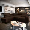 A modern living room with a large sectional sofa, a spiral staircase, and a fireplace. Produktbild-Vorschau